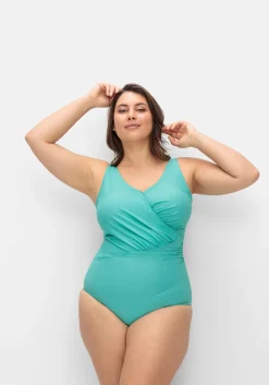 Badeanzug in Wickeloptik, tiefer Rückenausschnitt