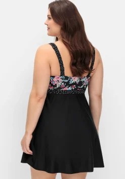 Badekleid im Mustermix mit integrierter Hose