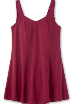 Badekleid mit V-Ausschnitt und integrierter Hose.