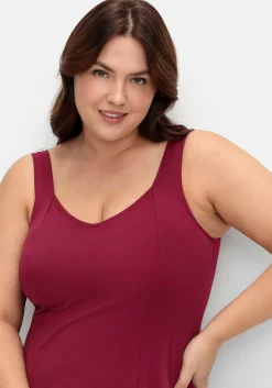 Badekleid mit V-Ausschnitt und integrierter Hose.