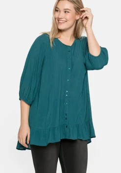 Bluse aus Crêpe, mit Volants am Saum