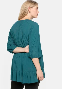 Bluse aus Crêpe, mit Volants am Saum