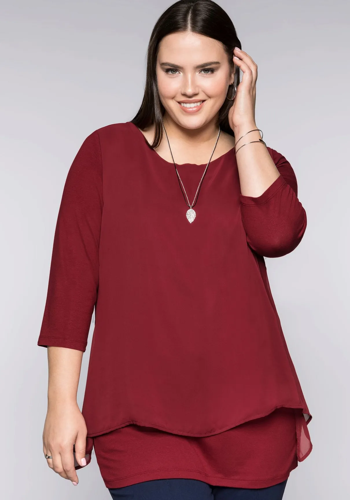 Blusenshirt in leichter A-Linie mit Zipfelsaum