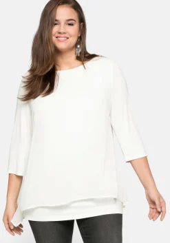 Blusenshirt in leichter A-Linie mit Zipfelsaum