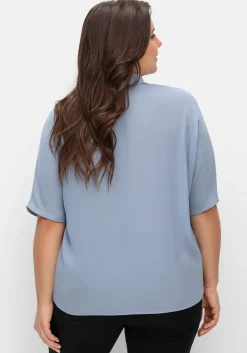 Crêpebluse mit Lochstickerei und Fledermausärmeln