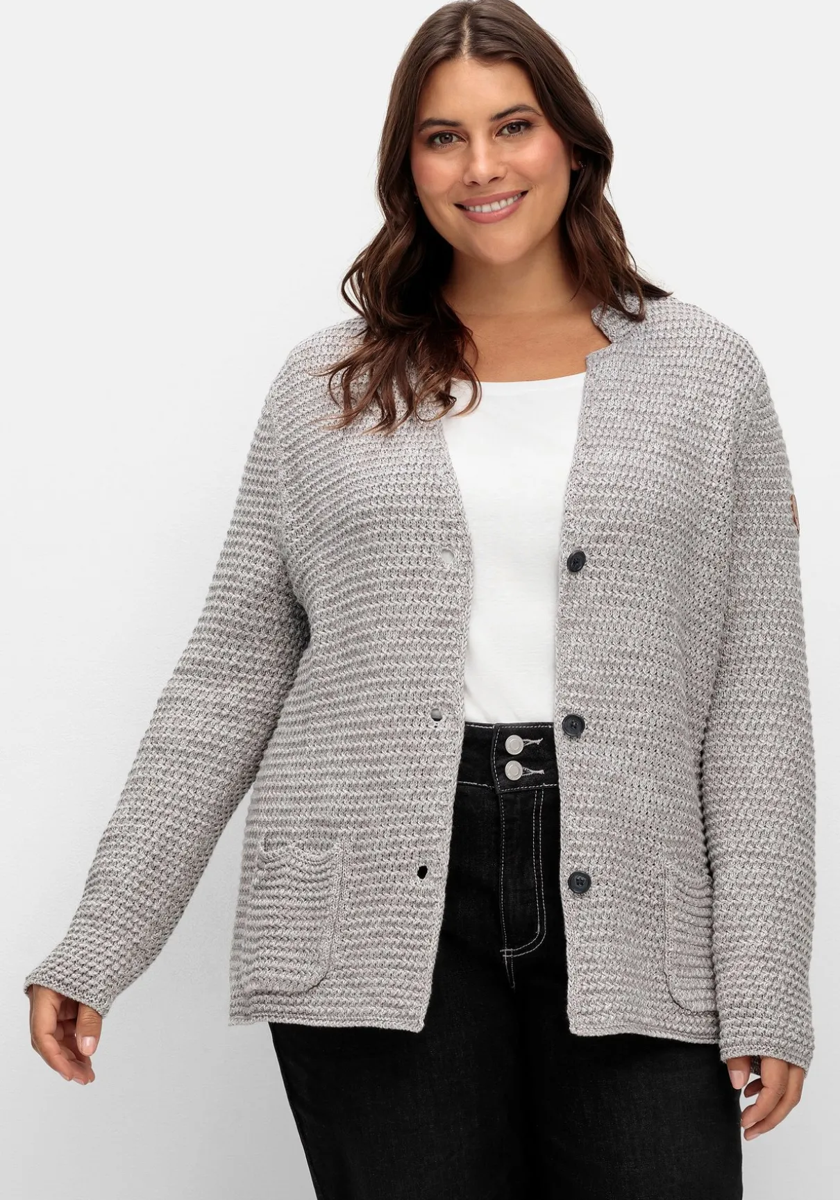 Grobstrickjacke mit Stehkragen und Taschen