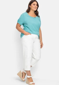 7/8-Jeans mit Zierknöpfen am Saum