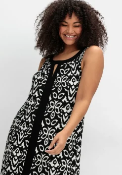 Jerseykleid mit Ornamentdruck und Cut-outs