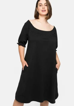 Jerseykleid mit Smok-Ausschnitt und Puffärmeln