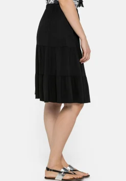 Jerseyrock mit Gummibund und stufigen Volants