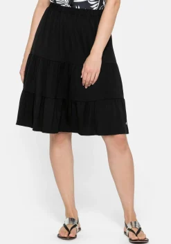 Jerseyrock mit Gummibund und stufigen Volants