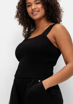 Jumpsuit mit Smok-Oberteil und weitem Bein