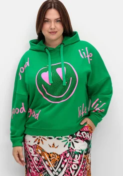 Kapuzensweatshirt mit Smiley-Druck und Glitzersteinen