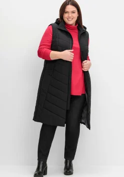 Lange Steppweste mit Kapuze und seitlichen Zippern