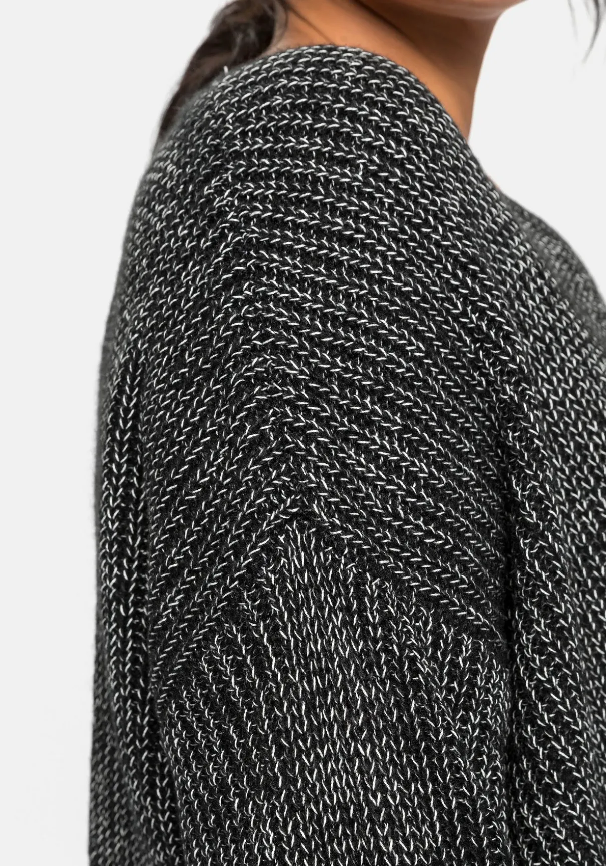 Pullover im Patentstrick, in melierter Optik