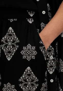 Schlupfhose mit Allover- und Bordürendruck