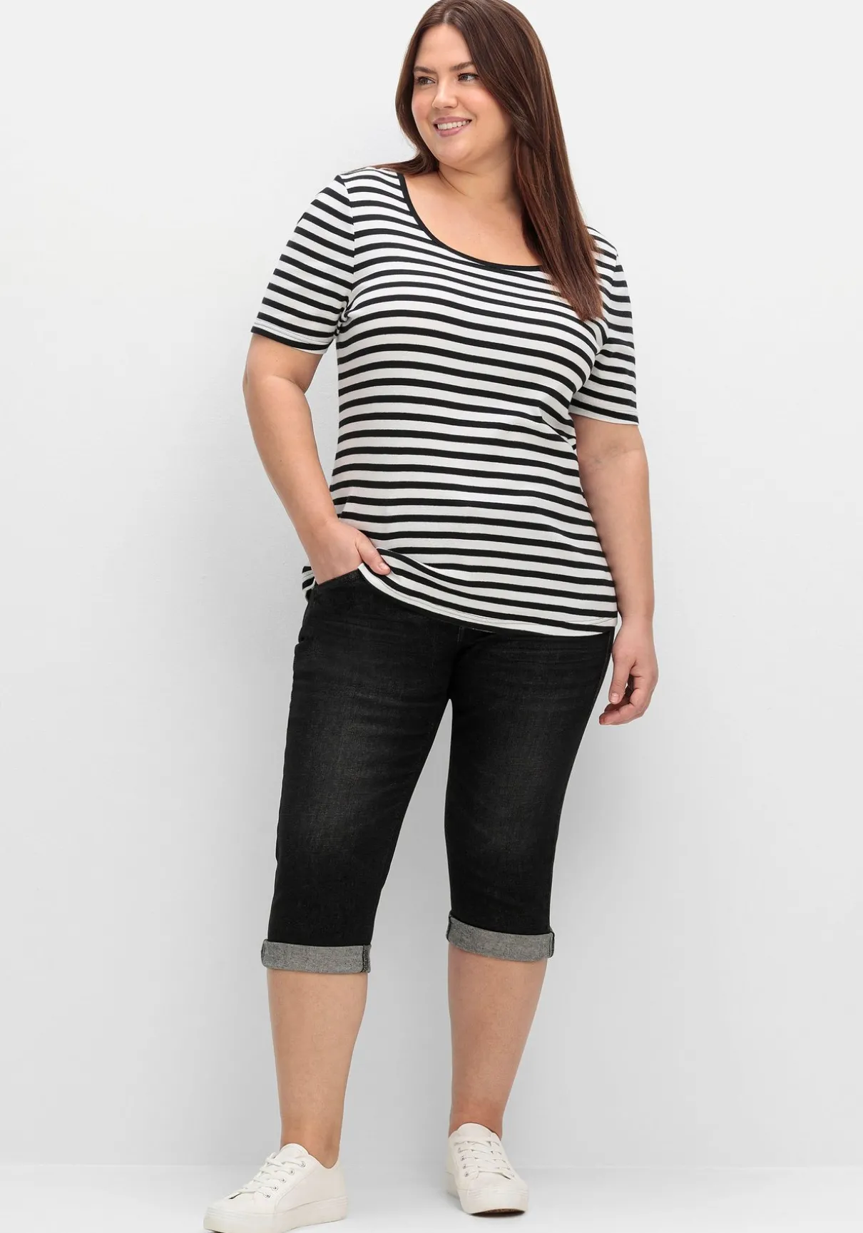 Schmale Caprijeans mit Used-Effekten