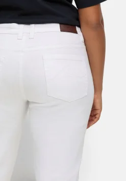 Schmale Caprijeans mit Used-Effekten