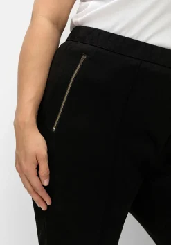 Schmale Hose in Velourslederoptik, mit Stretchbund