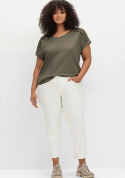 Schmale 7/8-Jeans mit Glitzersteinen am Saum