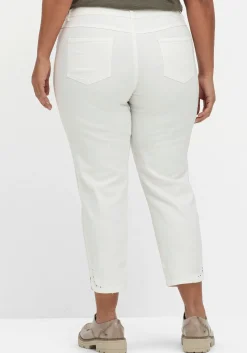 Schmale 7/8-Jeans mit Glitzersteinen am Saum