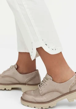 Schmale 7/8-Jeans mit Glitzersteinen am Saum