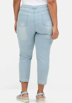 Schmale 7/8-Jeans mit Glitzersteinen am Saum