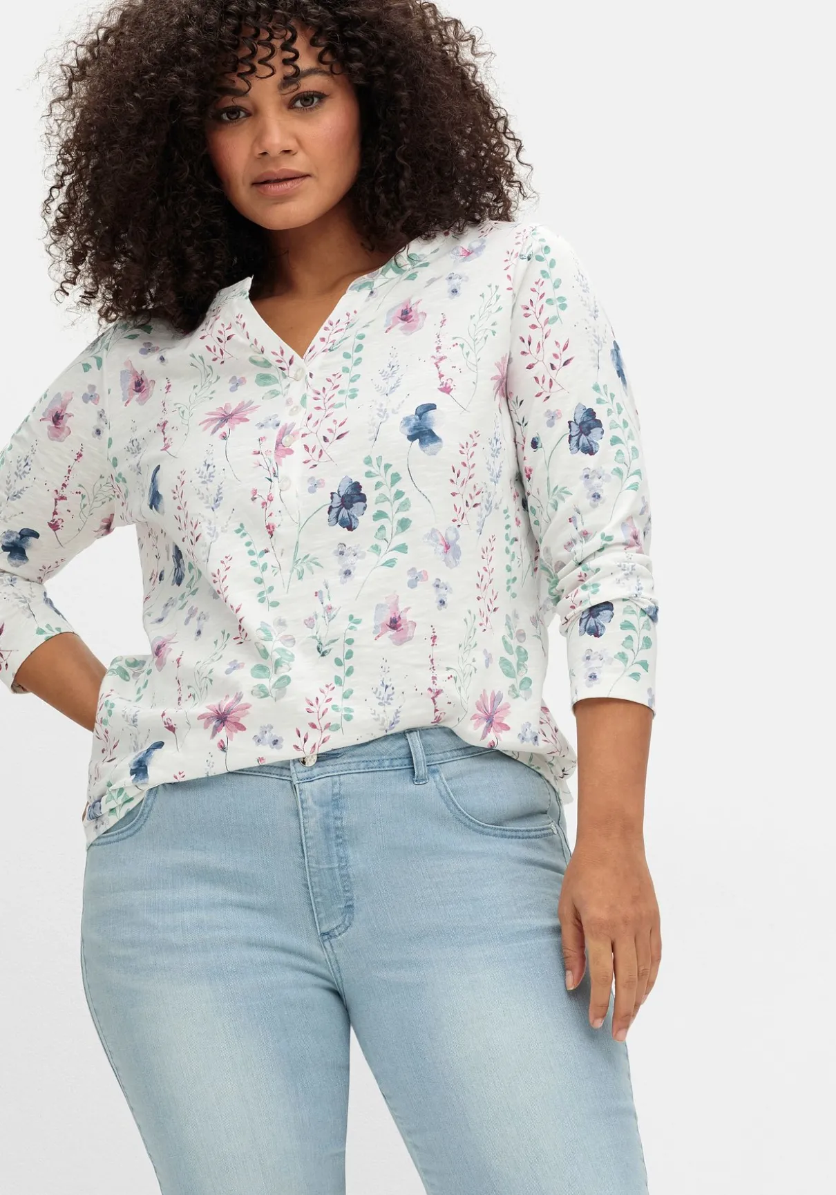 Schmale 7/8-Jeans mit Glitzersteinen am Saum