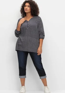 Schmale 7/8-Jeans mit Kontrasttape innen am Saum