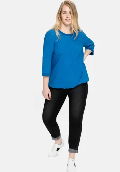 Slim Jeans mit vorverlegter Teilungsnaht