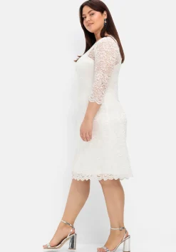 Spitzenkleid mit Wellensaum; knielang