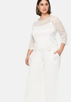 Tunika aus fein glänzender Spitze, mit Innentop