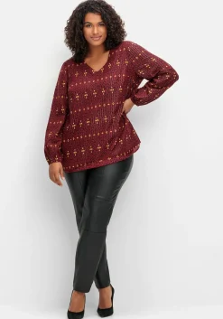 Tunika mit Glanz-Alloverdruck und tiefem V-Ausschnitt