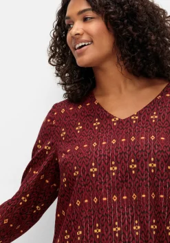 Tunika mit Glanz-Alloverdruck und tiefem V-Ausschnitt