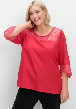 Tunika mit Spitze und Trompetenärmeln