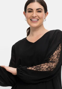 Tunika mit transparenter Spitze am Ärmel