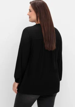 Tunika mit V-Schlitz, Rüsche und Bindeband