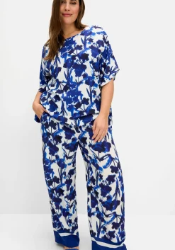 Weite, fließende Hose mit Blumendruck