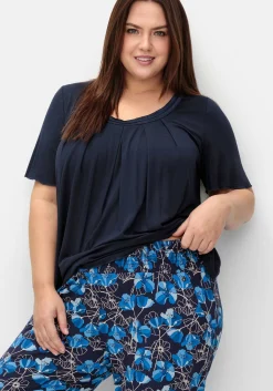 Weite Hose mit Blumendruck und breitem Smokbund